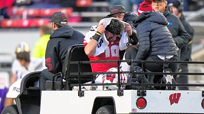 Wisconsin QB Danny O'Neil carted off field after getting injured against No. 24 Washington