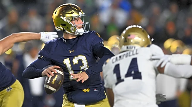 Carr throws 3 TD passes on snowy night to lead No. 10 Notre Dame past Navy, 49-10