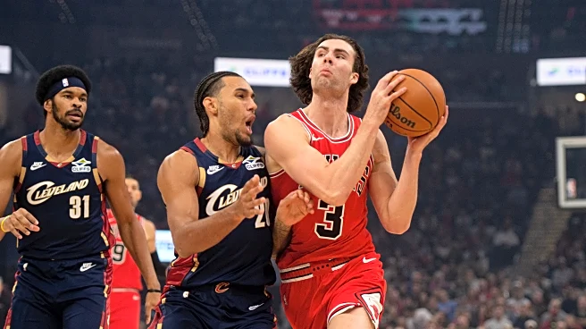 Mitchell makes go-ahead basket with 34 seconds left as Cavaliers rally to beat Bulls 128-122