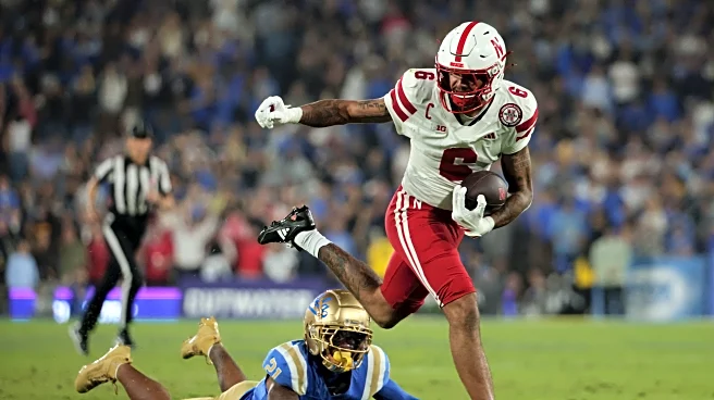 Lateef's impressive debut as a starter and Johnson's rushing lead Nebraska over UCLA 28-21