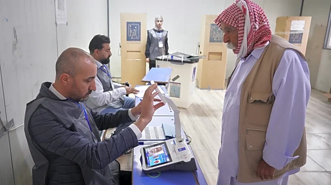 Iraq's displaced Yazidis and security forces cast ballots in early voting in parliament election
