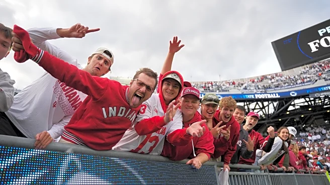 The Latest: 19 teams in the AP Top 25 take new spots