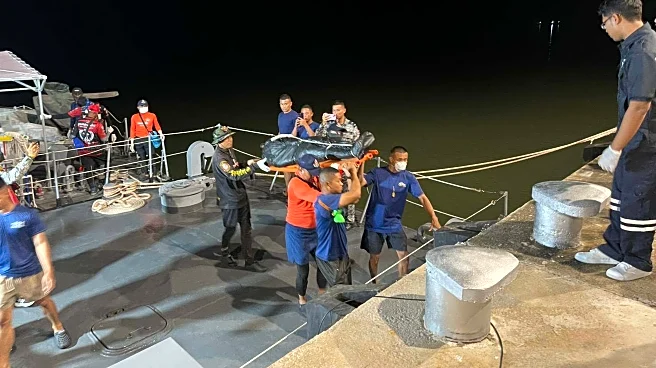 Rescuers searching for missing migrants after boat sinks off Malaysia recover 5 more bodies