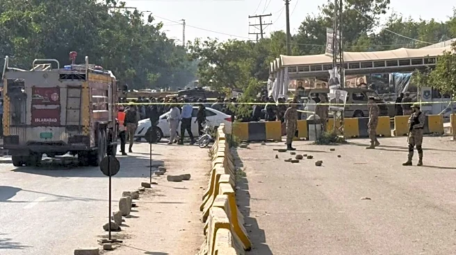 Pakistan's interior minister says a suicide bomber struck outside the Islamabad court, killing 12