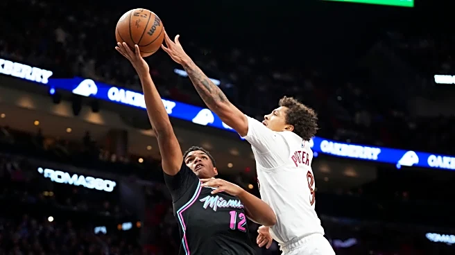 Short-handed Cavs rally to beat Heat 130-116 behind Jarrett Allen's double-double