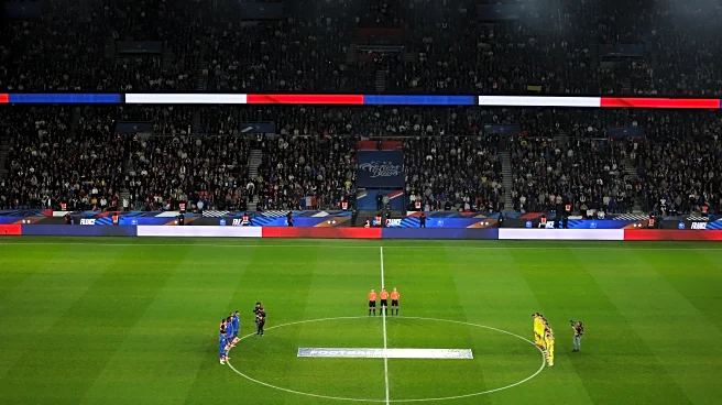 Players and fans remember victims of 2015 Paris terror attacks before France-Ukraine soccer match