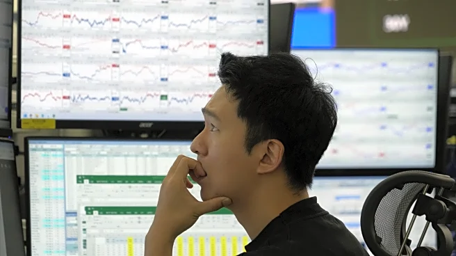 World shares skid, following Wall Street's retreat fueled by worries over AI and interest rates