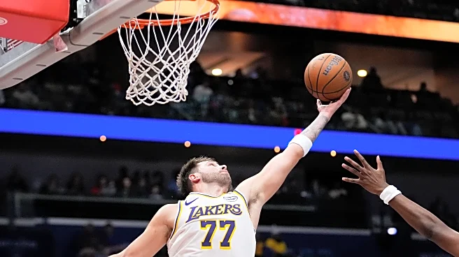 Doncic, Ayton and Reaves lead the Lakers past the Pelicans 118-104 to improve to 2-0 in NBA Cup play