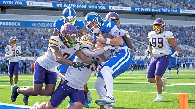 McGowan's three touchdowns power Kentucky to win