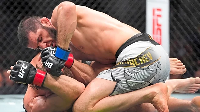 Islam Makhachev wins 170-pound title, ties UFC record with 16th straight victory