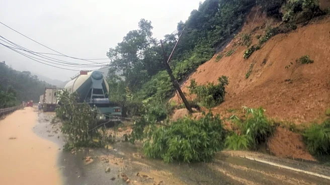 Landslide strikes bus on mountain pass in Vietnam, killing 6, as heavy rain persists