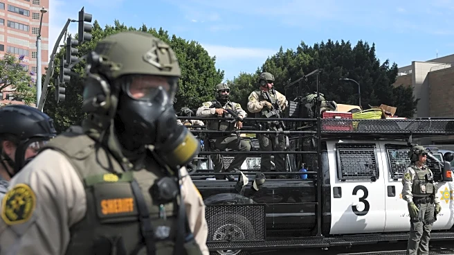 Trump administration sues California over law banning masked federal agents