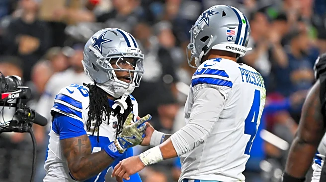 Cowboys honor Kneeland, then get 4 TD passes from Prescott in 33-16 win over Raiders