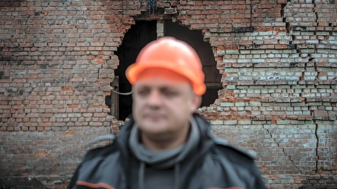 PHOTO ESSAY: Energy workers risk their lives to keep Ukraine's lights on as Russia attacks