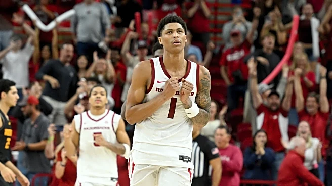 Thomas scores 26 point as No. 21 Arkansas rallies past Winthrop 84-83