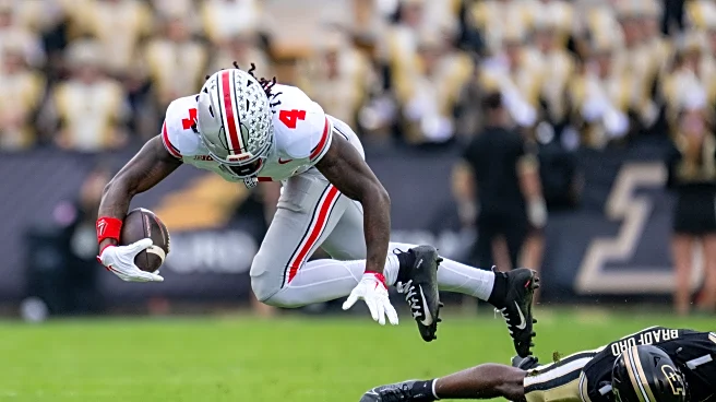 Top-ranked Ohio State faces Rutgers with uncertainty over star receivers