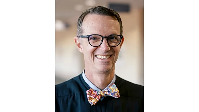 Missouri judge who wore an Elvis wig and often played his music in court agrees to step down