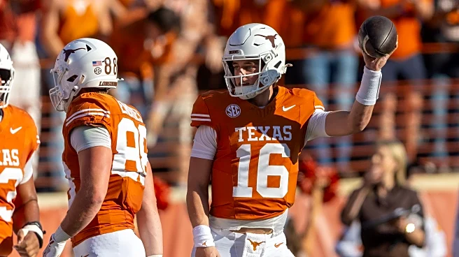 Arch Manning has 4 TDs passing, 1 rushing and 1 receiving as No. 17 Texas beats Arkansas 52-37