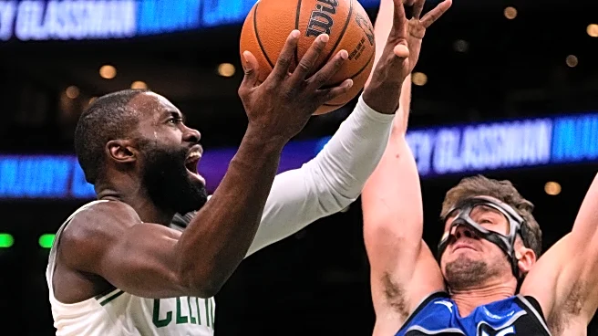 Jaylen Brown's 35 points lead Celtics in a 138-129 victory over the short-handed Magic