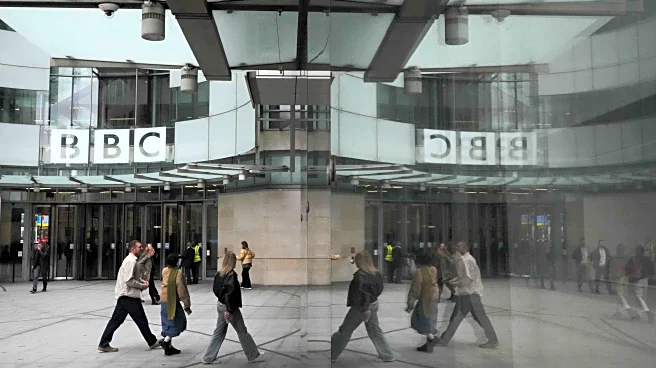 BBC leaders grilled by lawmakers over its standards after Trump threatened to sue