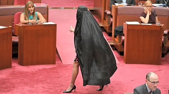 Australian Senator Pauline Hanson barred from Parliament for wearing burqa in protest