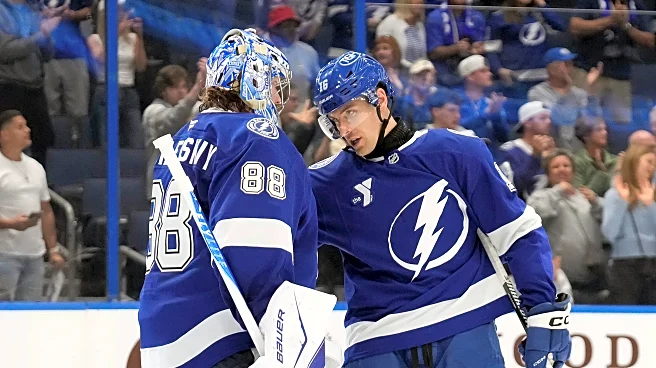 Andrei Vasilevskiy stops 32 shots, Lightning beat Flames 5-1 for 5th straight victory.