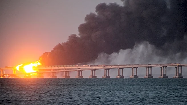 Russia convicts and hands life sentences to 8 people over attack on a key bridge to Crimea