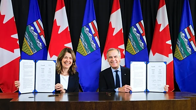 Canada's prime minister and Alberta's premier sign pipeline deal which could reverse oil tanker ban