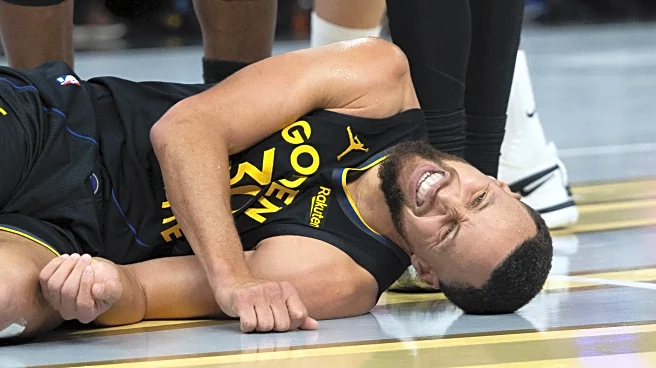 Warriors star Stephen Curry will be sidelined at least a week with a quad injury