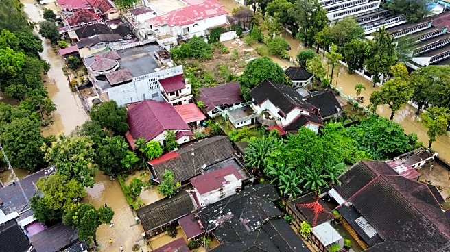 Damage and more rain hamper search for flood and landslide victims in Indonesia
