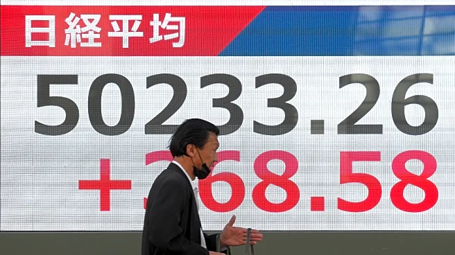 World shares are mixed after Wall Street pulls near its all-time high