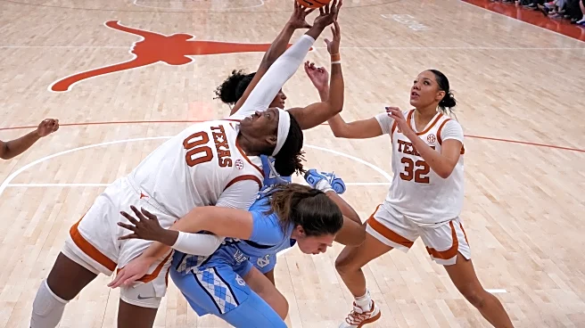Lee and Booker lead No. 2 Texas past No. 11 North Carolina 79-64 in ACC-SEC challenge