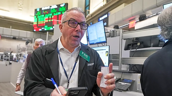 Wall Street rises to the edge of its all-time high