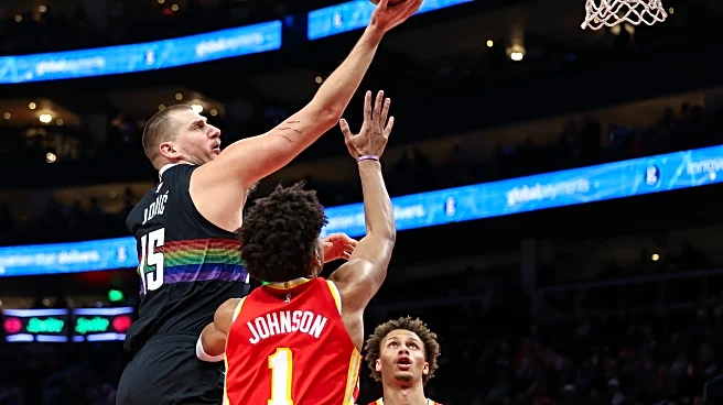 Jokic scores 39 points as Nuggets use big fourth quarter to rally for 134-133 win over Hawks