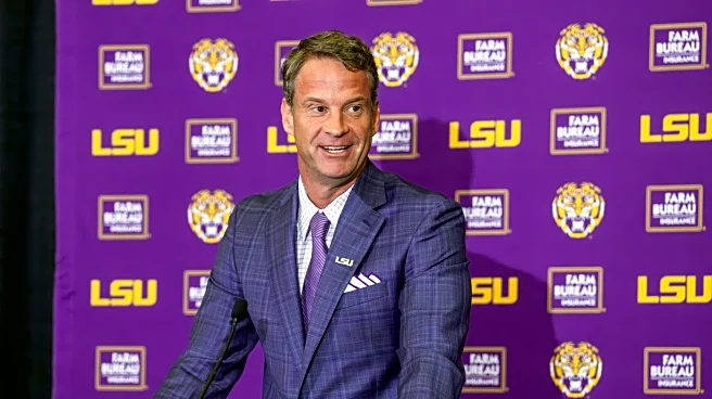 LSU coach Lane Kiffin announces that defensive coordinator Blake Baker will remain with the Tigers