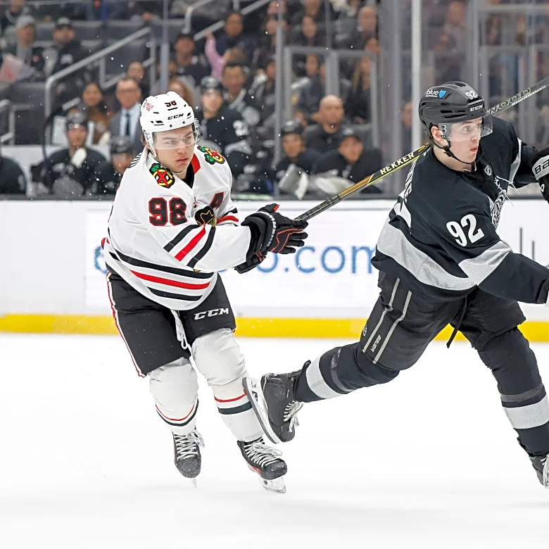 Clarke scores twice, Kuemper makes 23 saves in Kings' 6-0 romp over Blackhawks