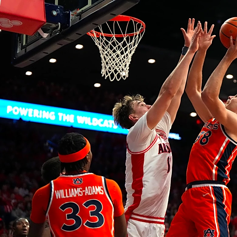 Peat scores 18 points, No. 2 Arizona blows out No. 20 Auburn 97-68 for 4th ranked win
