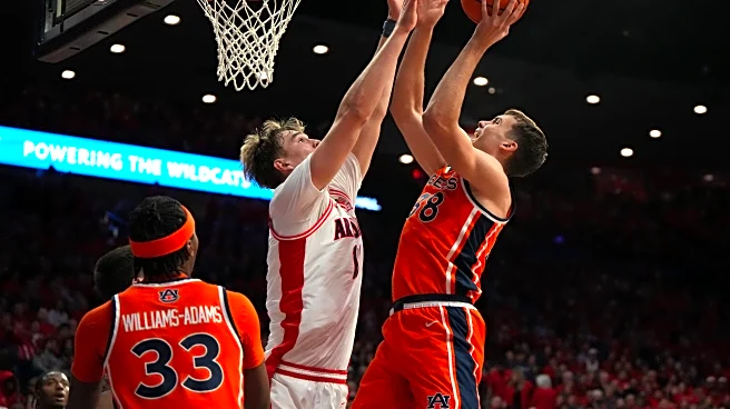 Peat scores 18 points, No. 2 Arizona blows out No. 20 Auburn 97-68 for 4th ranked win