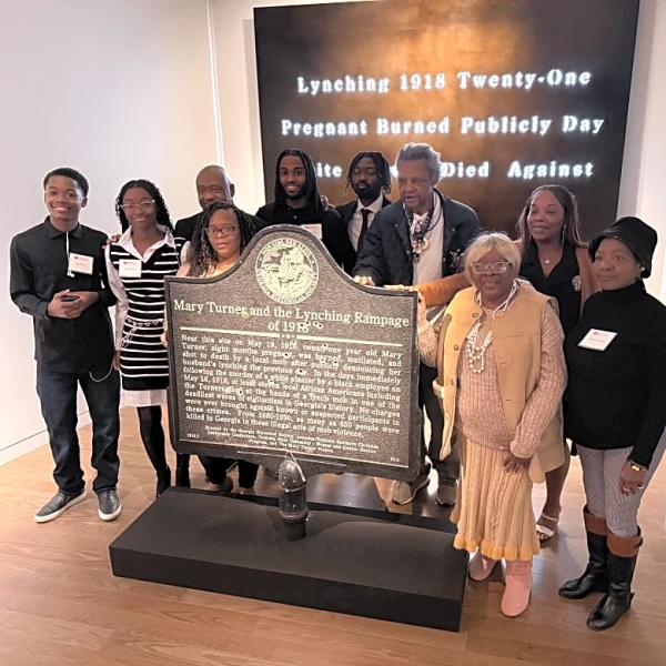 Bullet-pocked marker memorializing 1918 lynching goes on display in Atlanta