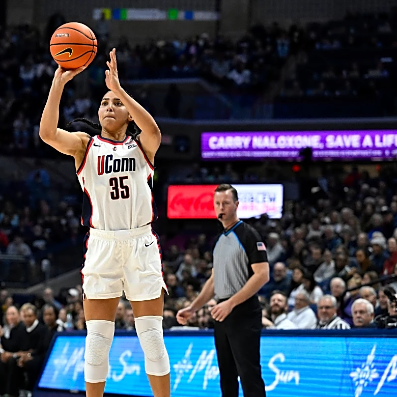 UConn's 23 steals lead top-ranked Huskies past DePaul on a day when Sue Bird's number is retired