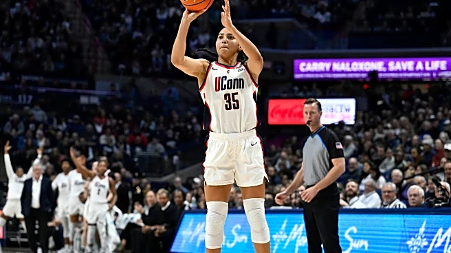 UConn's 23 steals lead top-ranked Huskies past DePaul on a day when Sue Bird's number is retired