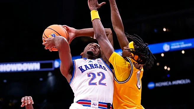 Peterson returns from injury with 17 points, leading No. 21 KU past Mizzou despite flu-like symptoms