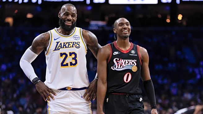 James hits go-ahead 3 and scores 29 points, Doncic has triple-double in Lakers' win over 76ers