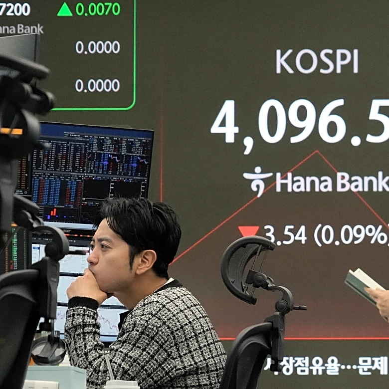 Asian shares are mixed ahead of interest rate decision by the Fed
