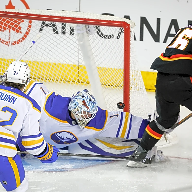 Sharangovich and Kadri lead surging Flames to 7-4 win over Sabres