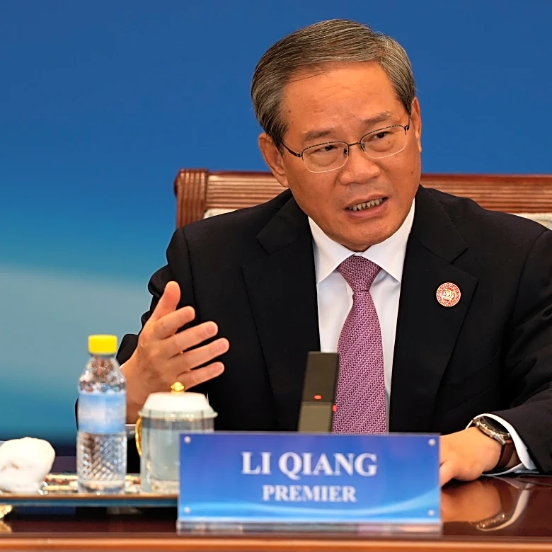 Chinese premier cites damage from US tariffs, as China's surplus surpasses $1 trillion