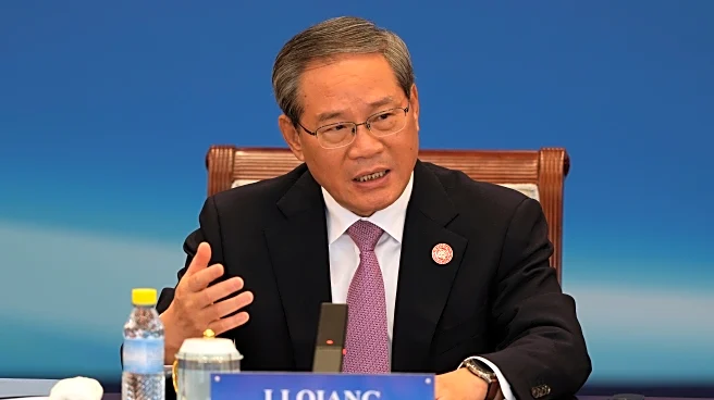 Chinese premier cites damage from US tariffs, as China's surplus surpasses $1 trillion