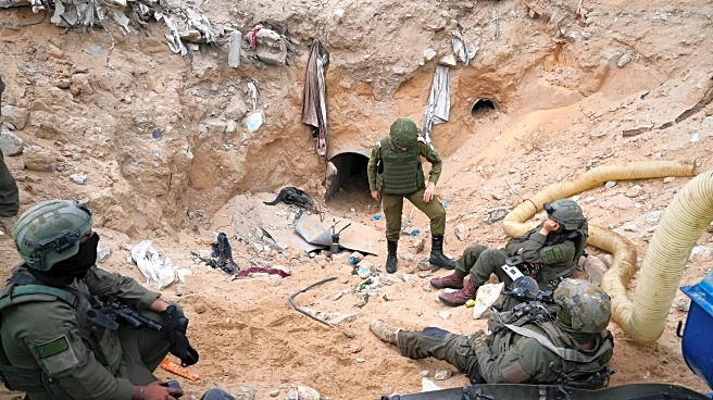 Israeli army takes journalists into a tunnel in a Gaza city it seized and largely flattened