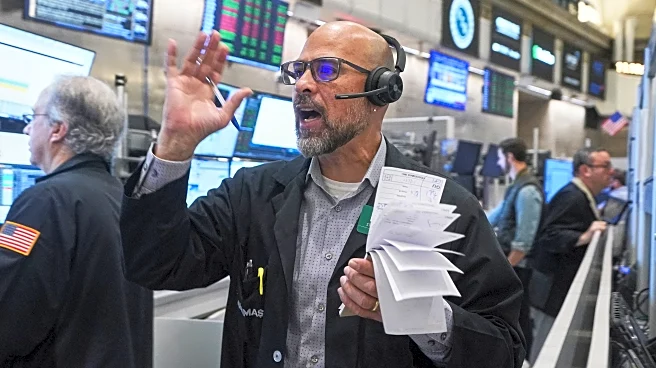 Wall Street drifts near its record high as Exxon Mobil climbs