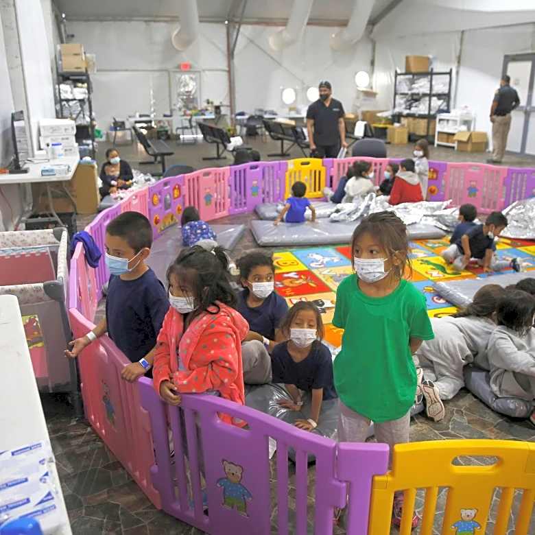 About 400 immigrant children were detained longer than the recommended limit, ICE admits